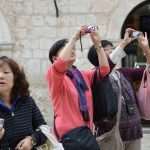 Grey Skies Don't Keep Tourists Away 4 Autumn Tourists 4